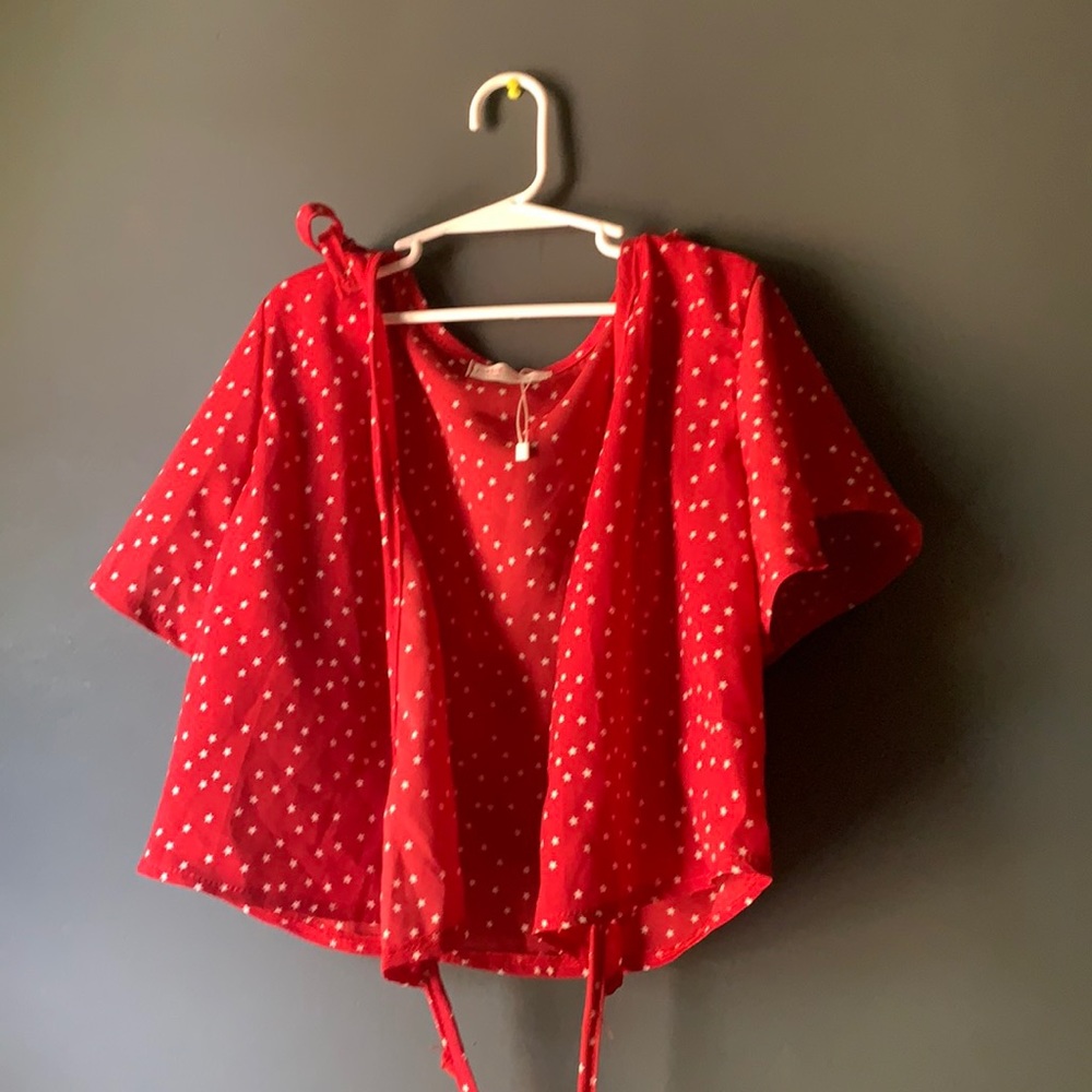 Cross body red and white Polkadot size small romwe